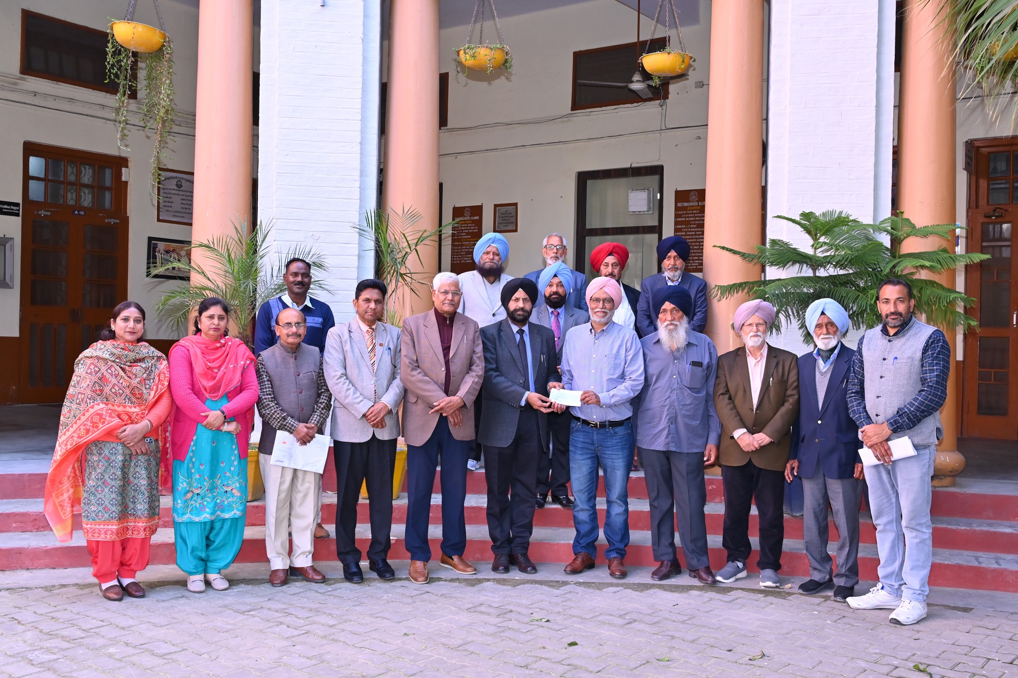 Kamaljit Singh Canada presented three lakh rupees to the college for the Mr. Ajaib Kamal memorial award and student scholarship money.